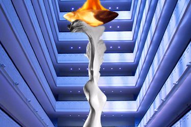 Fire in front of blue building